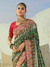 Bottle Green Patola Silk Saree With Contrast Blouse