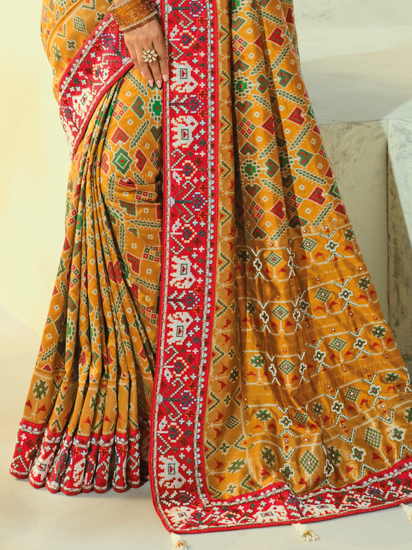 Mustard Yellow Patola Silk Saree With Contrast Blouse