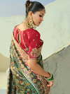 Bottle Green Patola Silk Saree With Contrast Blouse