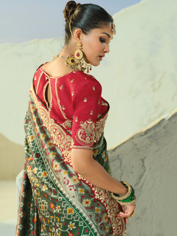 Bottle Green Patola Silk Saree With Contrast Blouse