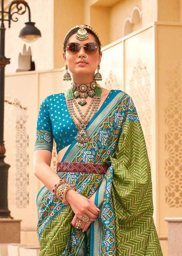 Brass Green And Sea Blue Woven Printed Patola Silk Saree