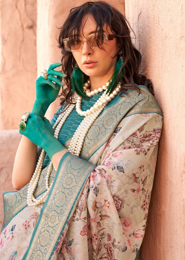 Cream Georgette Printed Saree With Teal Blue Zari Border