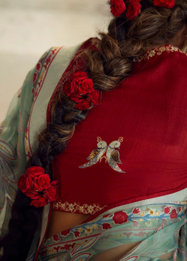 Luxurious Pastel Green Printed Brasso Organza Saree