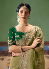 Pista Green Organza Silk Saree with Bottle Green Contrast Blouse