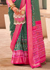 Rifle Green And Raspberry Pink Woven Printed Patola Silk Saree