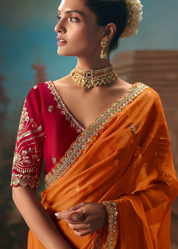 Saffron Orange Organza Silk Saree with Red Contrast Blouse