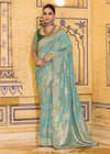 Sky Blue Banarasi Crepe Silk Saree with Dark Green Contrast Blouse