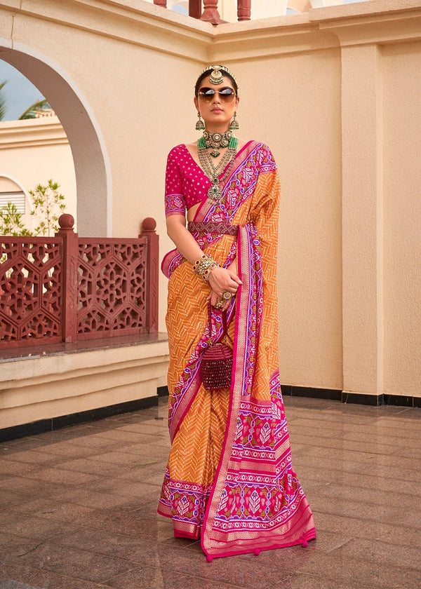 Tangerine Yellow And Rani Pink Woven Printed Patola Silk Saree