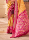 Tiger's Eye Yellow And Carmine Pink Woven Printed Patola Silk Saree