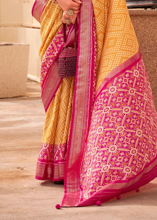 Tiger's Eye Yellow And Carmine Pink Woven Printed Patola Silk Saree