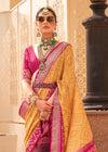 Tiger's Eye Yellow And Carmine Pink Woven Printed Patola Silk Saree