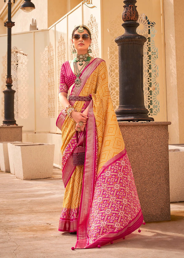Tiger's Eye Yellow And Carmine Pink Woven Printed Patola Silk Saree
