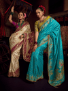 Turquoise Blue Banarasi Dola Silk Saree With Contrast Blouse
