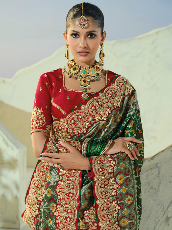 Bottle Green Patola Silk Saree With Contrast Blouse