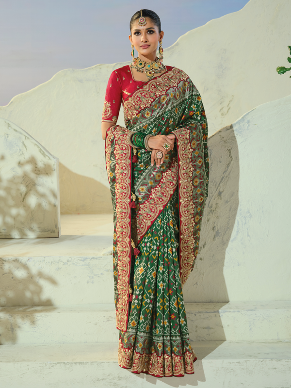 Bottle Green Patola Silk Saree With Contrast Blouse