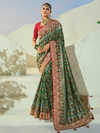 Bottle Green Patola Silk Saree With Contrast Blouse