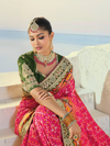 Rani Pink Patola Silk Saree With Contrast Blouse