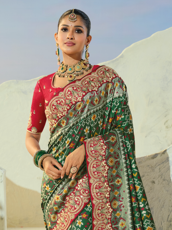 Bottle Green Patola Silk Saree With Contrast Blouse