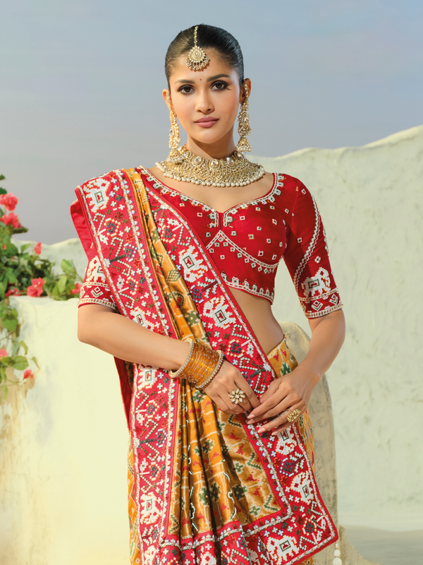 Mustard Yellow Patola Silk Saree With Contrast Blouse