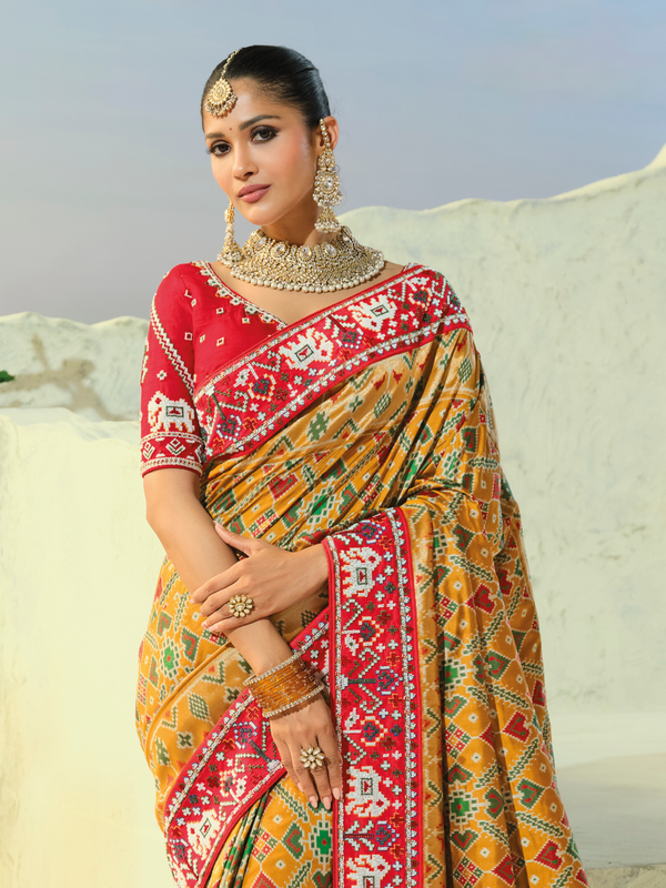 Mustard Yellow Patola Silk Saree With Contrast Blouse