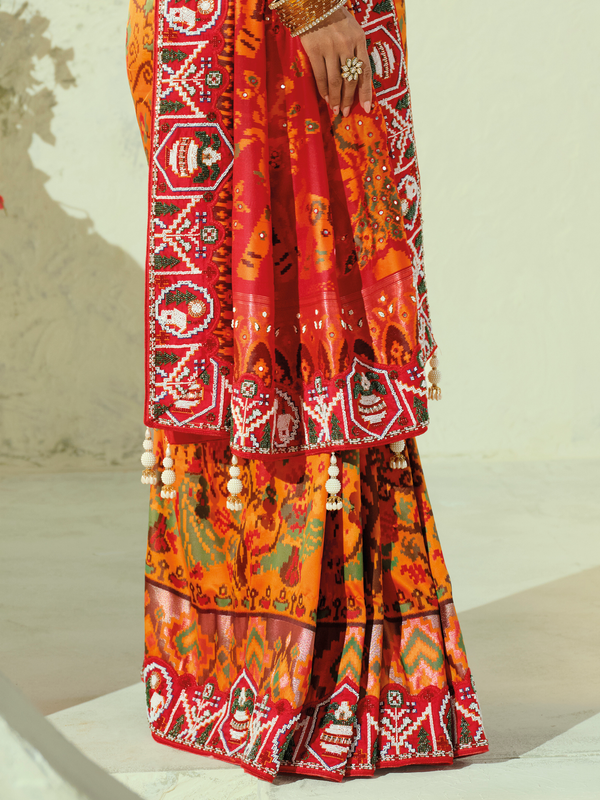 Saffron Orange Patola Silk Saree With Contrast Blouse
