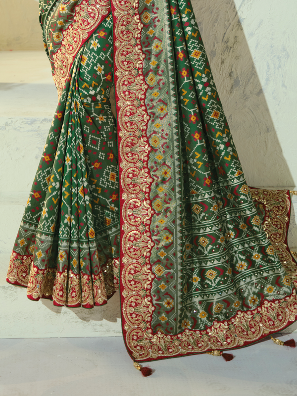 Bottle Green Patola Silk Saree With Contrast Blouse