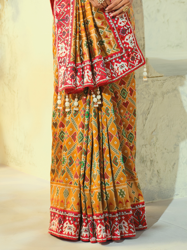 Mustard Yellow Patola Silk Saree With Contrast Blouse