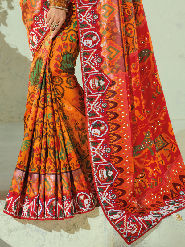 Saffron Orange Patola Silk Saree With Contrast Blouse
