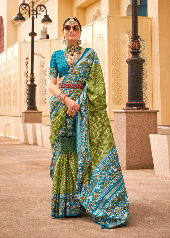 Brass Green And Sea Blue Woven Printed Patola Silk Saree