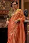 Coral Orange Tussar Silk Saree With Ikkat Pallu and Contrast Blouse