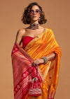 Festive Yellow Handloom Banarasi Silk Saree With Tassels