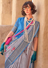 Light Grey Georgette Printed Saree With Sky Blue Zari Border