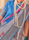 Light Grey Georgette Printed Saree With Sky Blue Zari Border