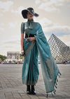 Pastel Blue Handloom Satin Silk Saree With Tassels