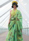 Pine Green Printed Zari Woven Tissue Silk Saree