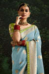 Powder Blue Designer Banarasi Dola Silk Saree With Golden Zari Work