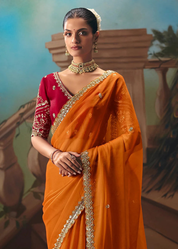 Saffron Orange Organza Silk Saree with Red Contrast Blouse