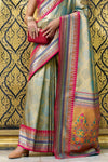 Sea Green Tissue Ikat Silk Saree