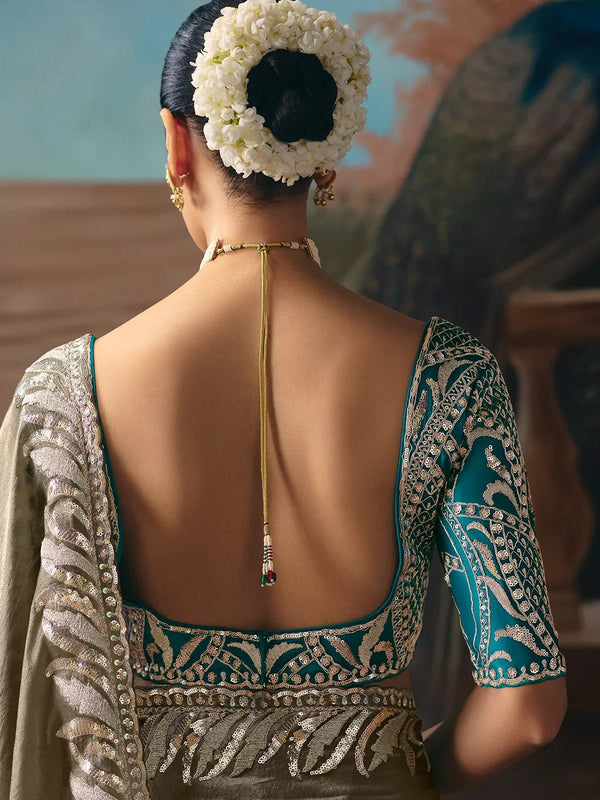 Silver Grey Tissue Silk Saree with Teal Contrast Blouse