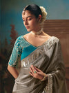 Silver Grey Tissue Silk Saree with Teal Contrast Blouse