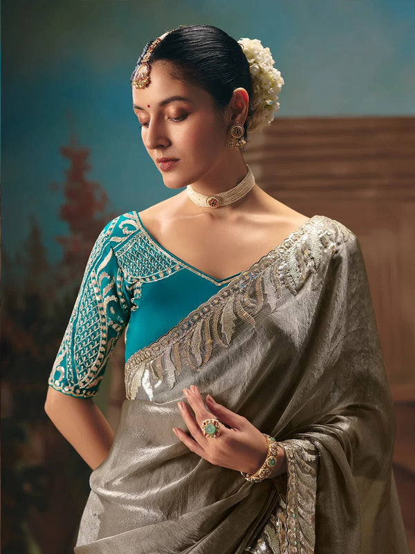 Silver Grey Tissue Silk Saree with Teal Contrast Blouse