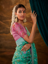 Sea Green Banarasi Organza Silk Saree With Contrast Blouse