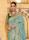 Sky Blue Banarasi Crepe Silk Saree with Dark Green Contrast Blouse