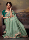 Soft Pastel Green Designer Organza Silk Saree With Contrast Blouse