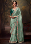 Soft Pastel Green Designer Organza Silk Saree With Contrast Blouse